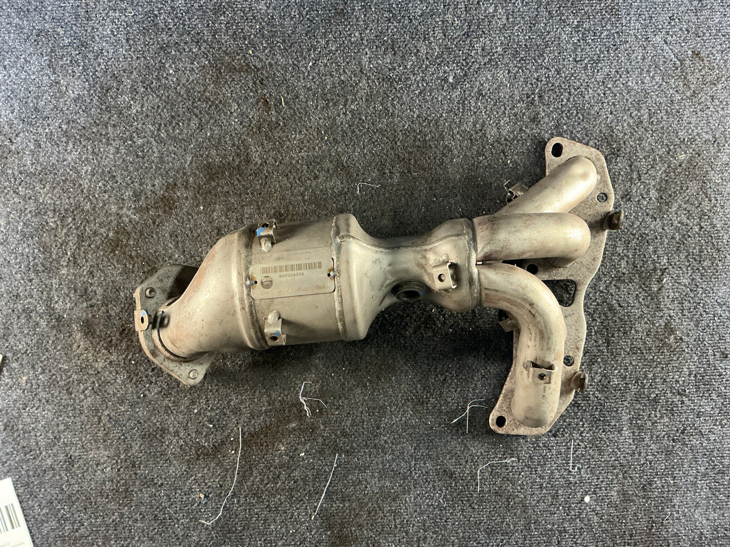 NISSAN Exhaust Manifold OEM PN 140E25HJ0E EPA Code ACX