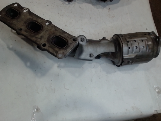 Left, Catalytic Converter with Integrated Exhaust Manifold