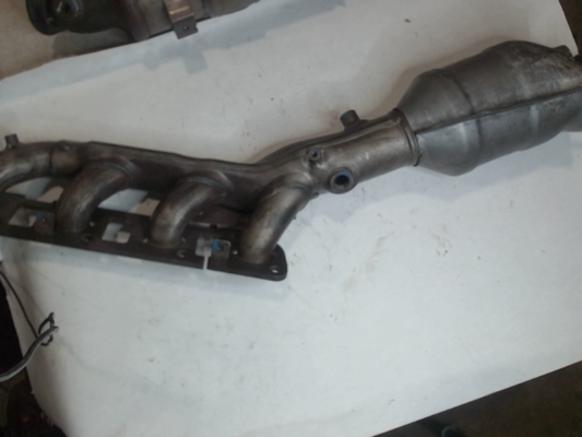 Right, Catalytic Converter with Integrated Exhaust Manifold