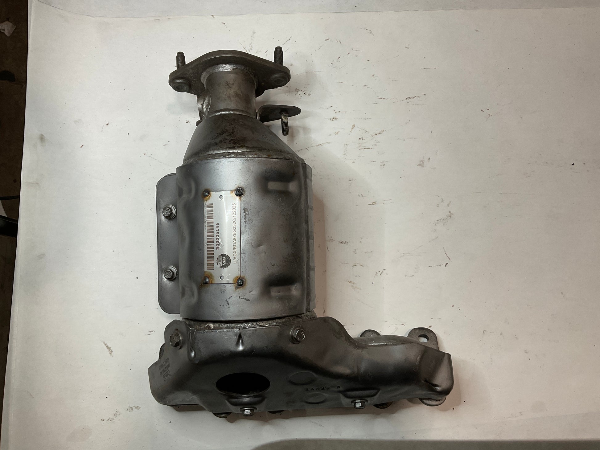 Left, Catalytic Converter with Integrated Exhaust Manifold